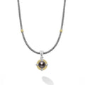 A tahitian black pearl surrounded by diamonds and smooth sterling silver Caviar beading and 18K gold stations forms this necklace. LAGOS diamonds are the highest quality natural stones. Length offered in 16 inches and 18 inches.