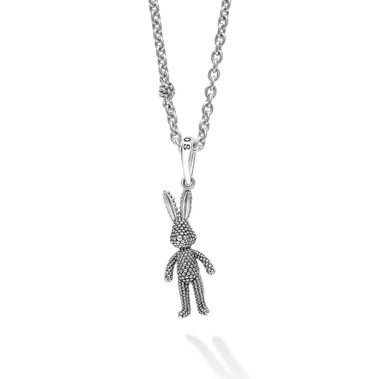 Artfully crafted sterling silver moving rabbit pendant with Caviar beading finished on a versatile sterling silver ball chain necklace.