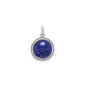 Lapis gemstone surrounded by sterling silver Caviar beading form this crossbone emblem amulet.