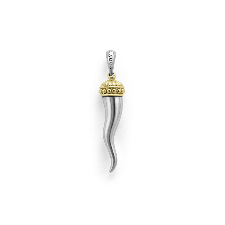 Meticulously crafted in 18K gold and sterling silver, this statement horn amulet is a symbol of strength and protection.