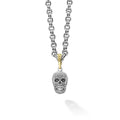 Artfully crafted skull amulet made of sterling silver Caviar beading. Finished on a 3mm double link chain necklace.