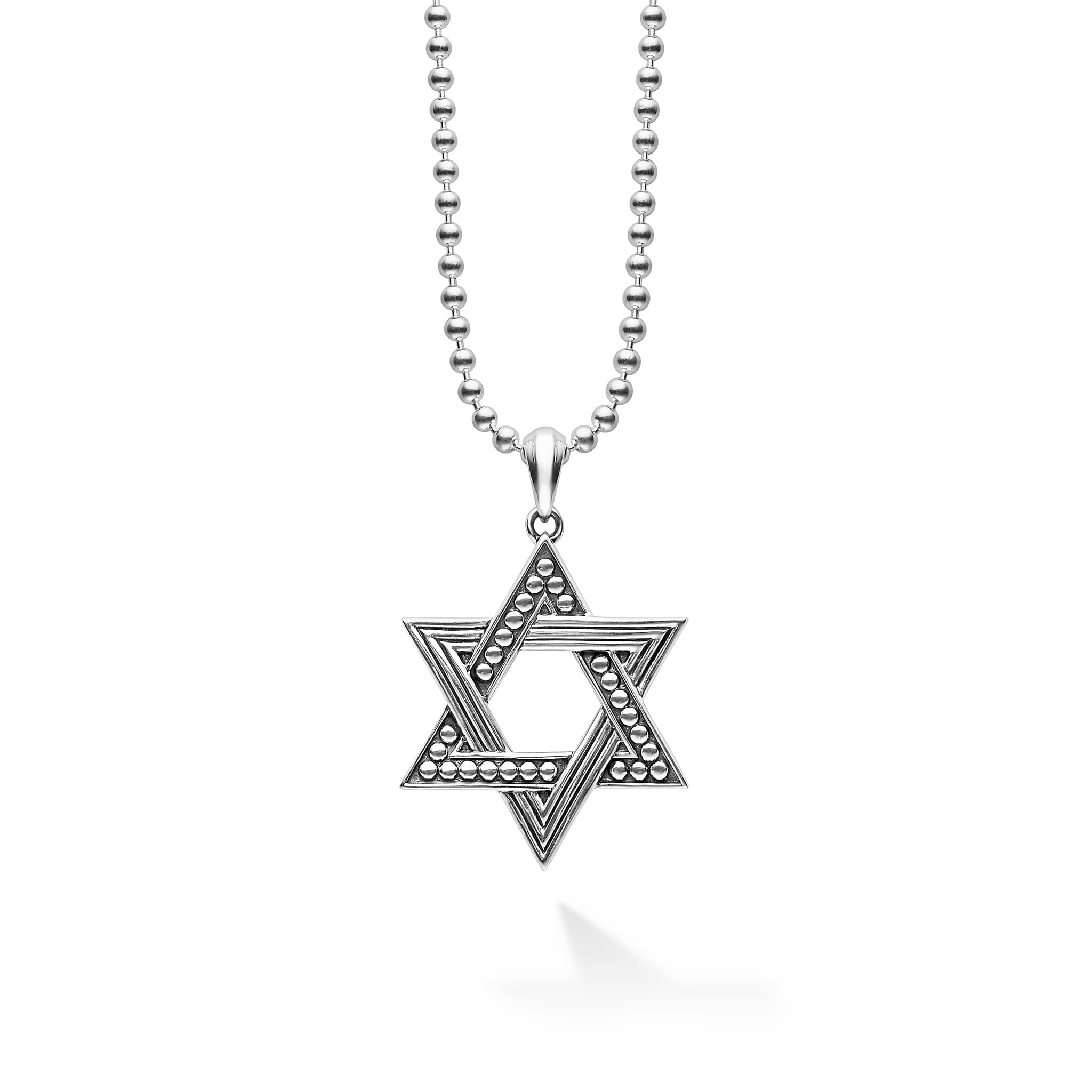 Sterling silver in a star motif forms this Star of David amulet. Finished on a sterling silver ball chain necklace.