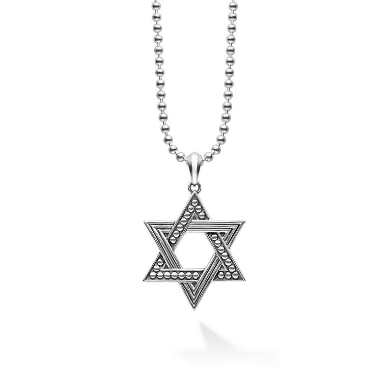 Sterling silver in a star motif forms this Star of David amulet. Finished on a sterling silver ball chain necklace.