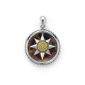 Pietersite gemstone surrounded by sterling silver and 18K gold Caviar beading forms this circle burst amulet.