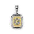Our Signature Caviar sterling silver and 18K gold octagon initial 'G' charm accented with diamonds. Chain sold separately. LAGOS diamonds are the highest quality natural stones.