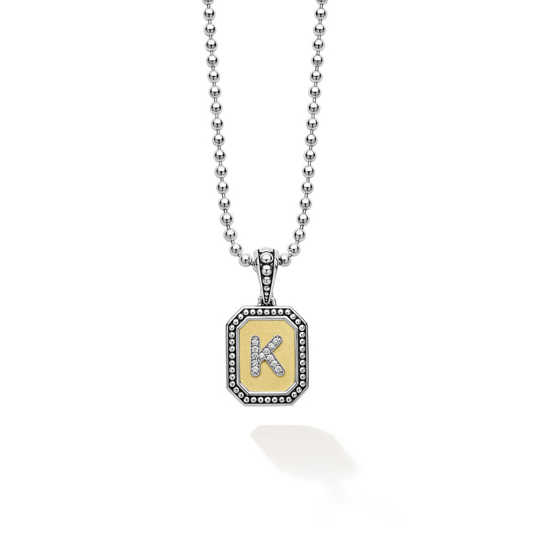 Our Signature Caviar sterling silver and 18K gold octagon initial 'K' charm accented with diamonds finished on a sterling silver ball chain necklace. LAGOS diamonds are the highest quality natural stones.