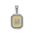 Our Signature Caviar sterling silver and 18K gold octagon initial 'M' charm accented with diamonds. Chain sold separately. LAGOS diamonds are the highest quality natural stones.