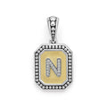 Our Signature Caviar sterling silver and 18K gold octagon initial 'N' charm accented with diamonds. Chain sold separately. LAGOS diamonds are the highest quality natural stones.