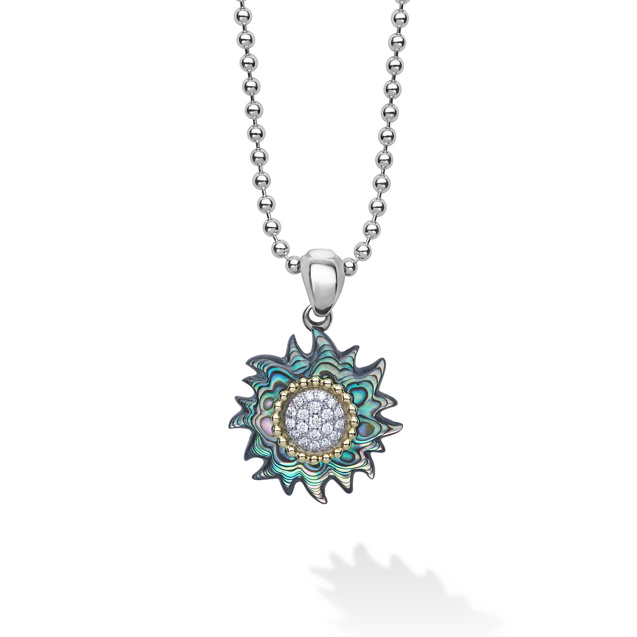 A LAGOS exclusive. This unique sun pendant necklace is crafted with abalone, diamonds, and 18K gold Caviar beading on a sterling silver chain. LAGOS diamonds are the highest quality natural stones.