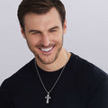 man weareing Caviar Beaded Cross Amulet in sterling silver