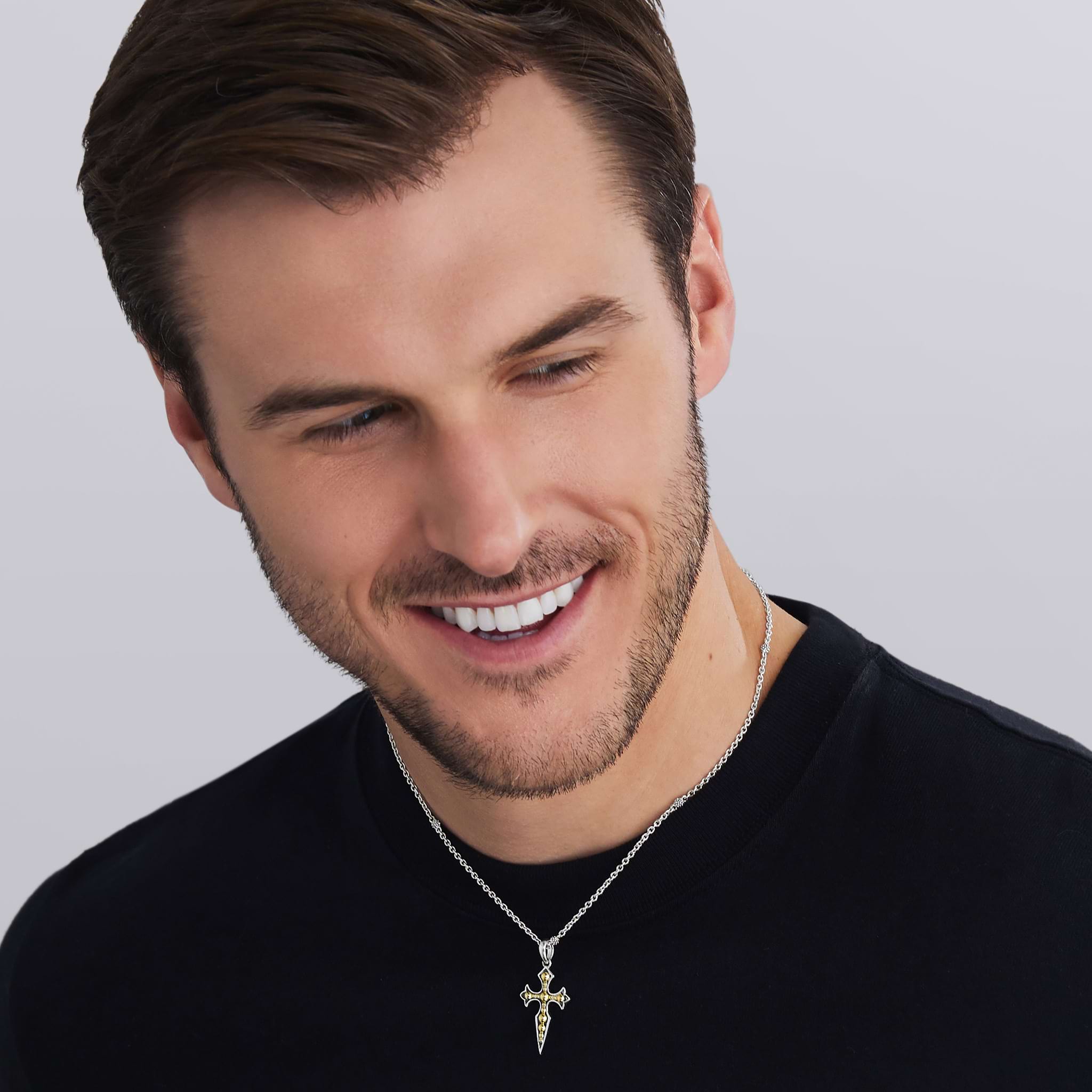 man wearing Two-Tone Medieval Amulet featuring 18K gold beading details 