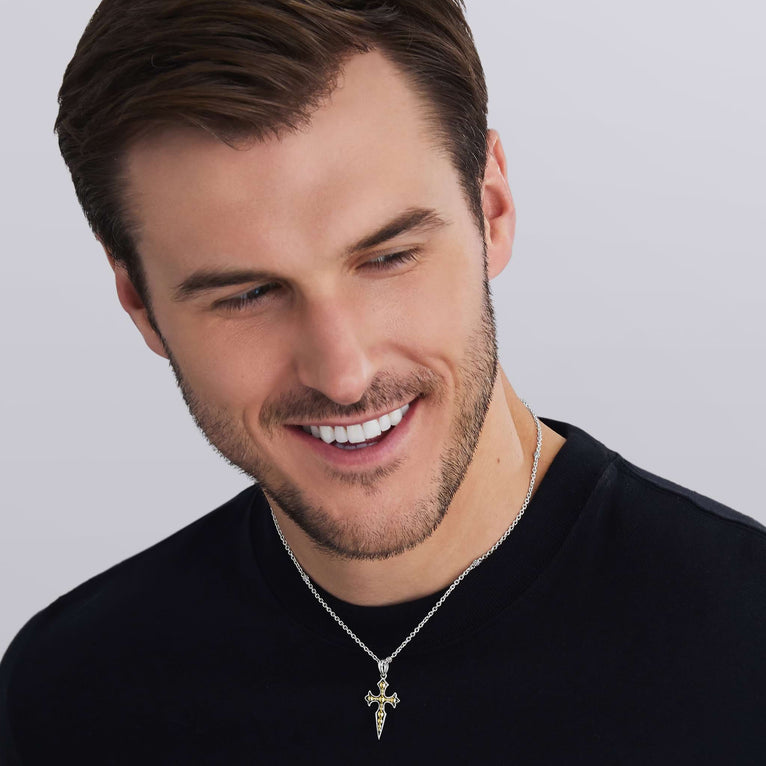 man wearing Two-Tone Medieval Amulet featuring 18K gold beading details 
