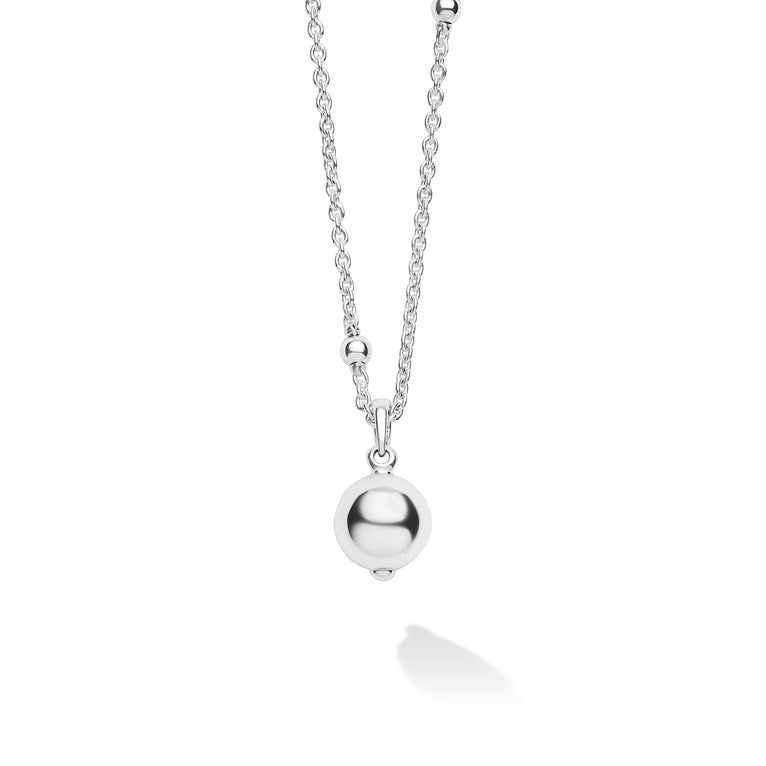 Silver necklace with a round pendant on a white background