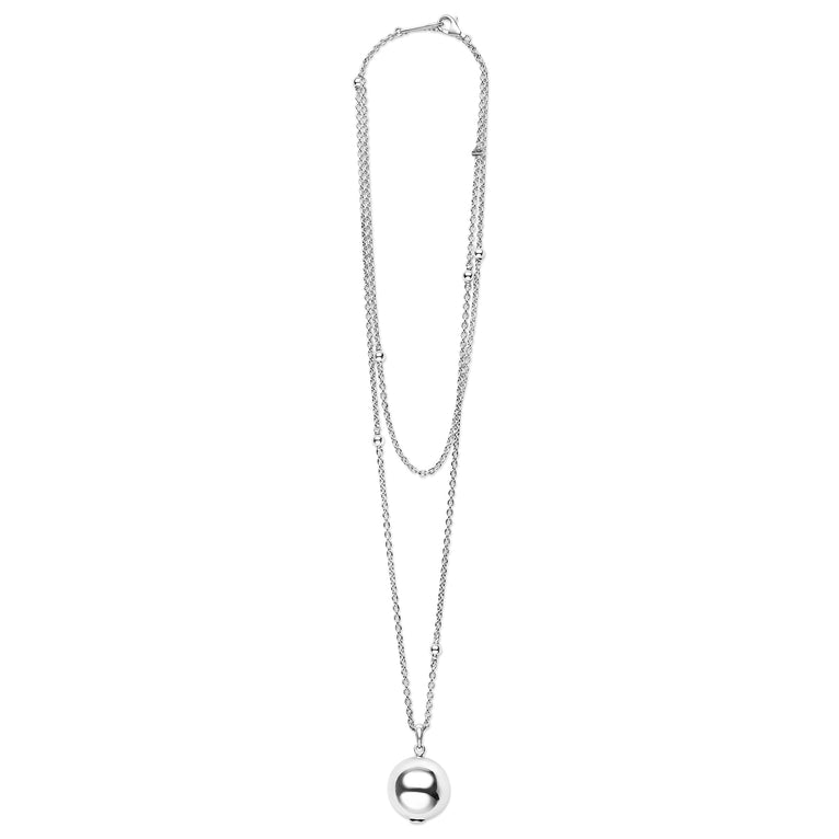 Silver necklace with a round pendant on a white background
