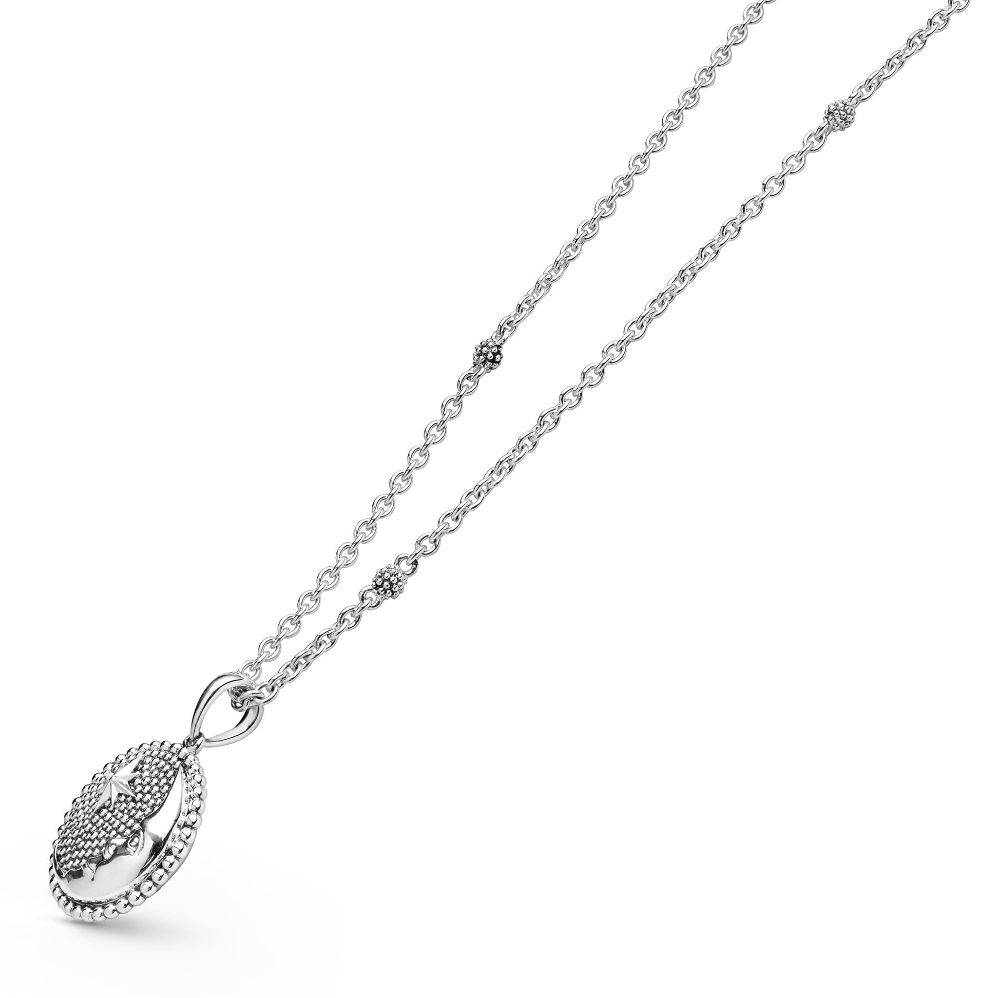 Side view of Sterling Silver Moon & Star Pendant Necklace