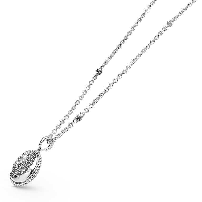 Side view of Sterling Silver Moon & Star Pendant Necklace
