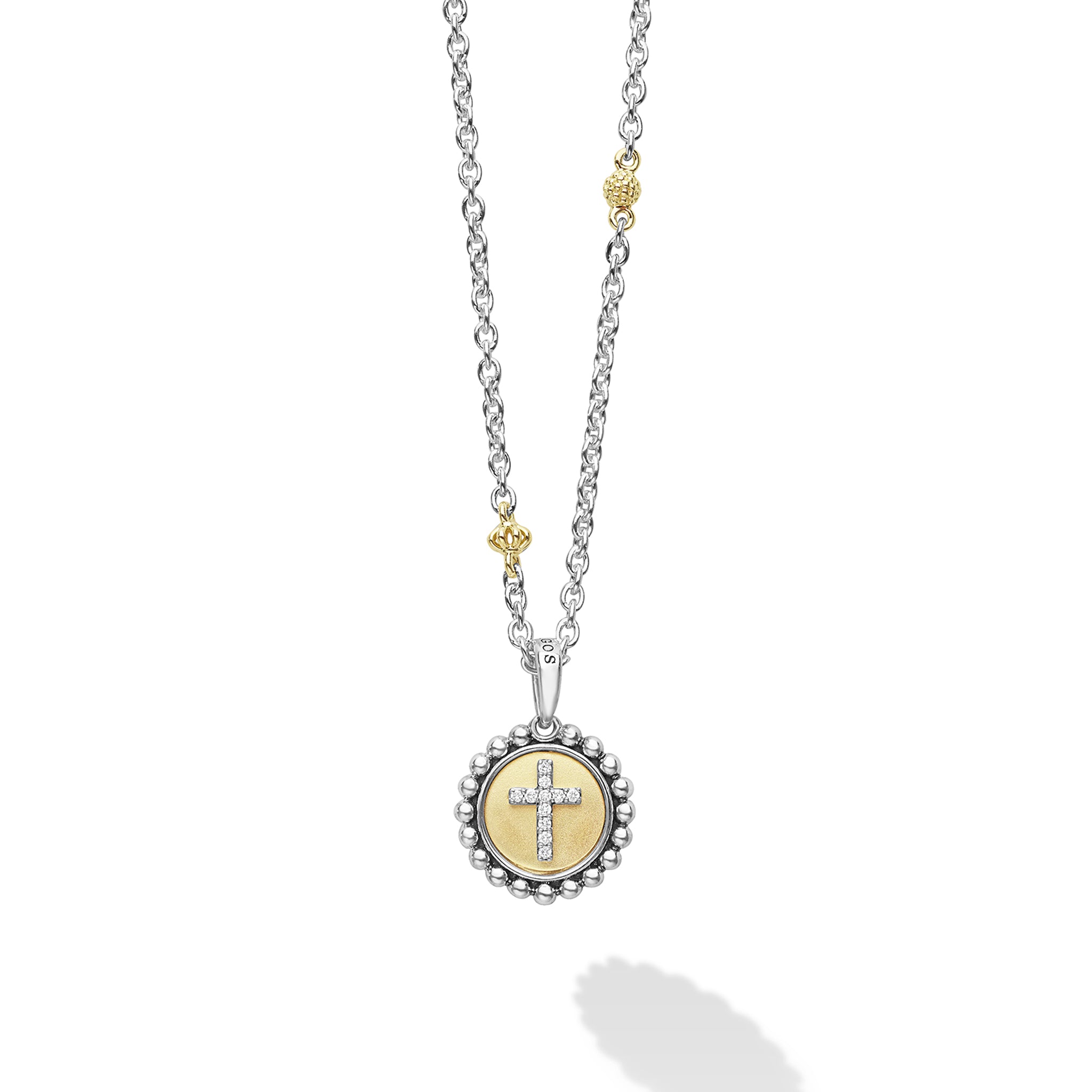 Signature Caviar Two-Tone Diamond Cross Charm Necklace featuring a silver chain, gold bead, and crystal-studded cross medallion, blending elegance with modern craftsmanship.