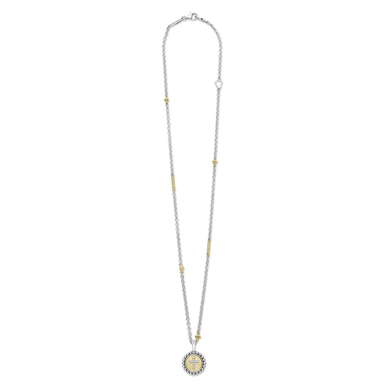 Signature Caviar Two-Tone Diamond Cross Charm Necklace featuring a silver-gold chain with gold beads, ending in a diamond-accented cross on a round pendant.