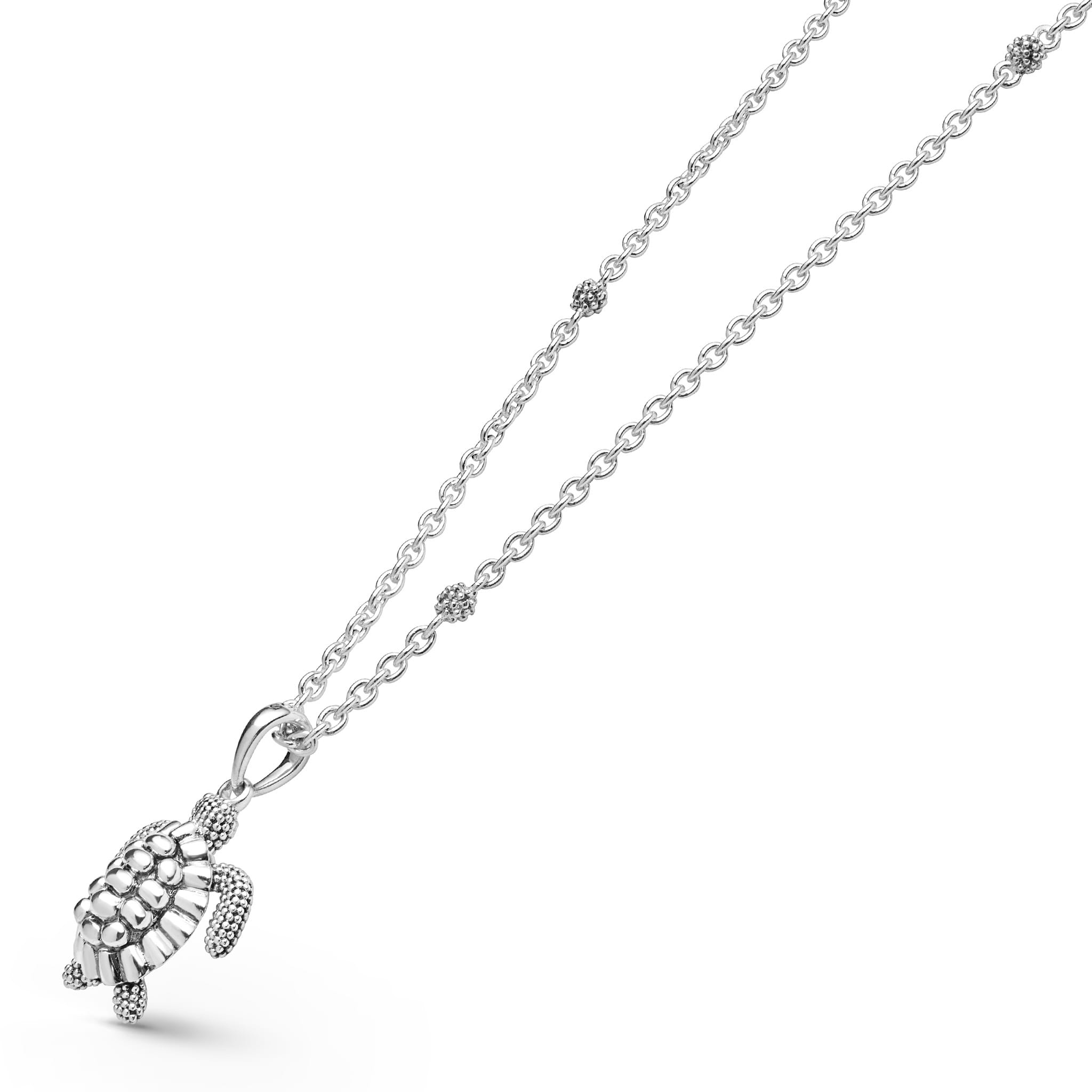 Side view of Sterling Silver Mini Sea Turtle Pendant Necklace