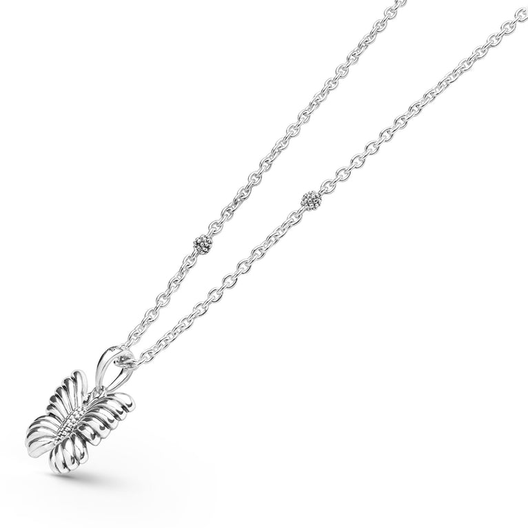 Side view of Sterling Silver Mini Butterfly Pendant Necklace