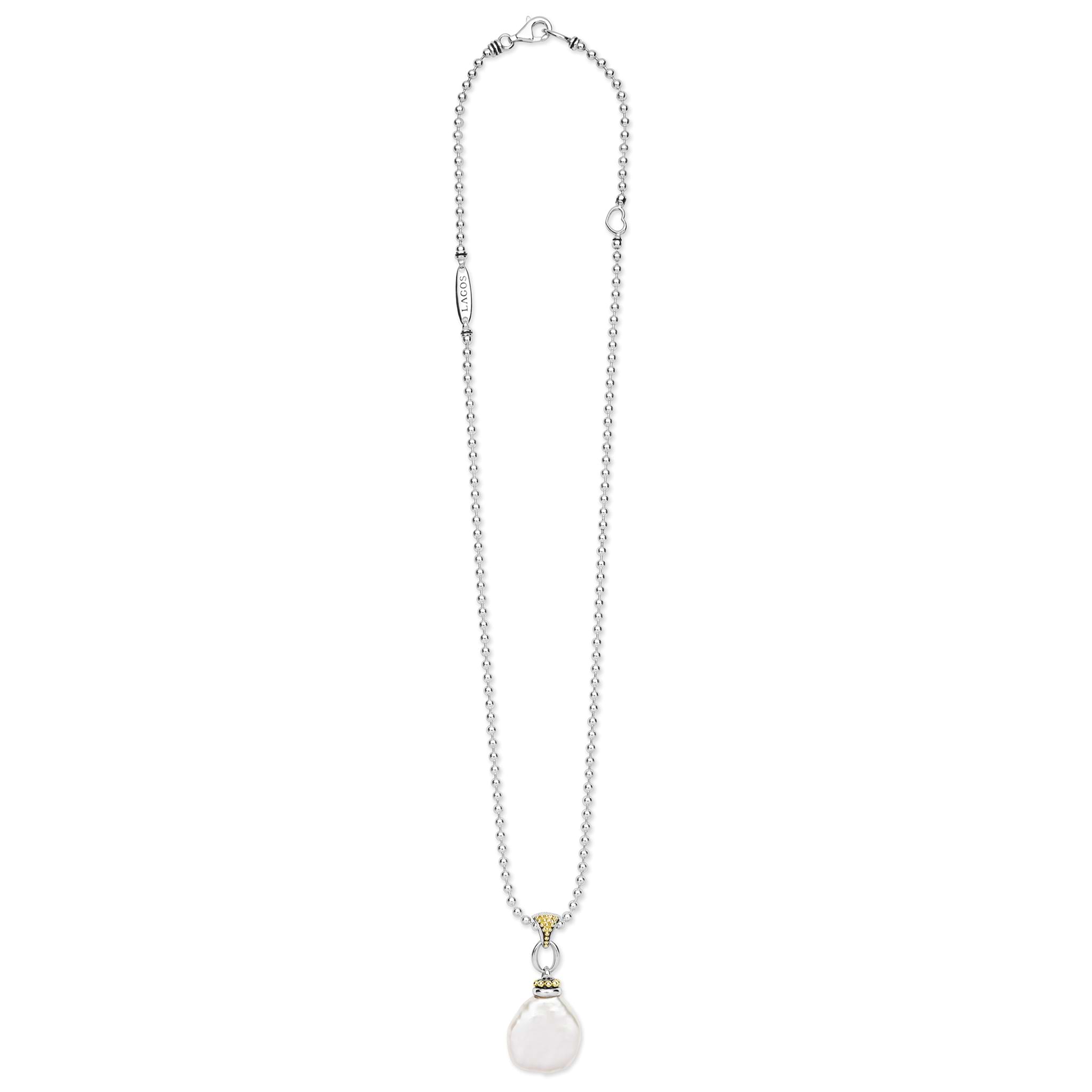 Luna Two-Tone Pearl Caviar Pendant Necklace with a baroque pearl drop, accented by 18K gold, sterling silver, and caviar beading on an adjustable ball-chain.