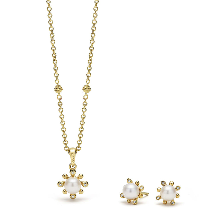 A LAGOS exclusive. This 18K gold diamond cultured freshwater pearl earrings and necklace jewelry set features two fleur pearl LAGOS designs. Diamonds are G-H color SI clarity.