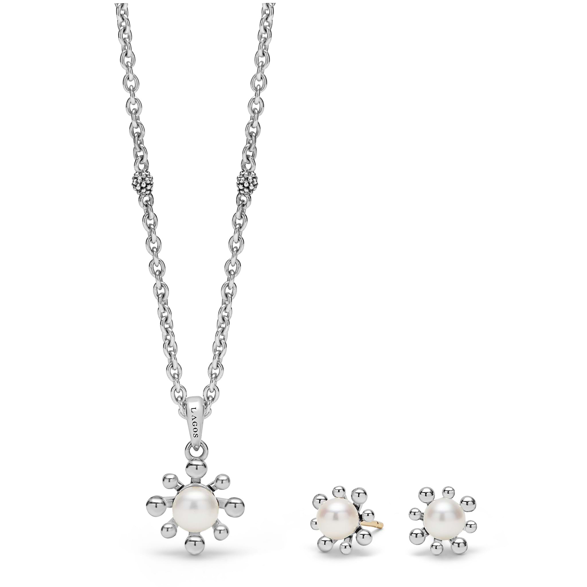 A LAGOS exclusive. This cultured freshwater pearl earrings and necklace jewelry set features two fleur pearl LAGOS designs.