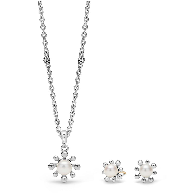 A LAGOS exclusive. This cultured freshwater pearl earrings and necklace jewelry set features two fleur pearl LAGOS designs.