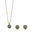 A LAGOS exclusive. One set of 18K gold tahitian black pearl necklace and earrings.