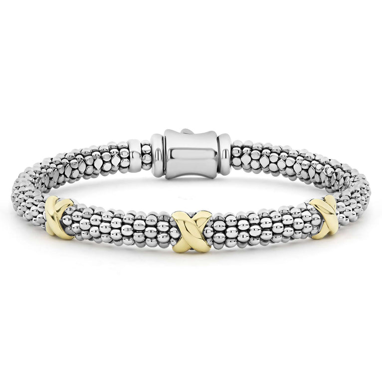 Smart Caviar 18K Gold Gift Set featuring a woven sterling-silver bead bracelet with gold “X”-shaped links and a sleek barrel clasp.