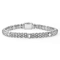 Smart Caviar Sterling Silver Bracelet Gift Set featuring a multi-strand beaded bracelet with silver spheres and cylindrical spacers, showcasing LAGOS's elegant craftsmanship.