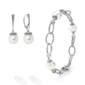 An ideal gift including sophisticated cultured freshwater pearl earrings framed by flutes of sterling silver and an 18 inch cultured freshwater pearl bracelet finished on a signature lobster clasp.