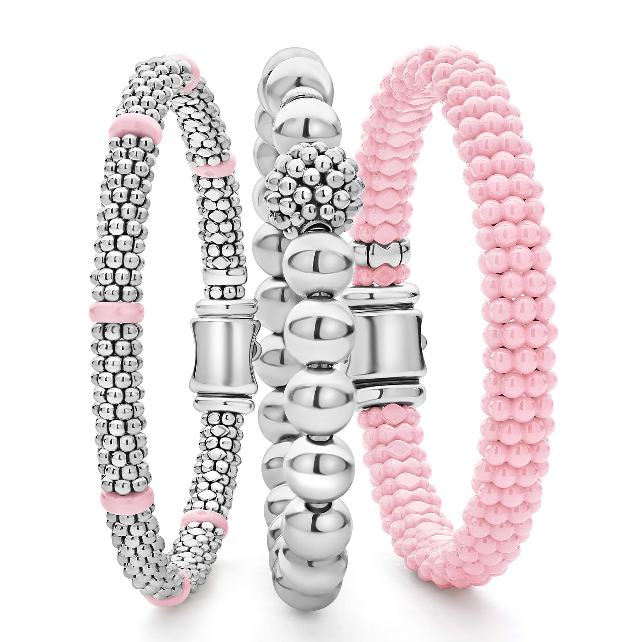 A LAGOS exclusive. Three classic bracelets to layer and make your own. One stretch bracelet made of smooth sterling silver. One pink ceramic Caviar beaded bracelet. One sterling silver Caviar beaded bracelet with a pop of pink ceramic stations.