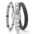 A LAGOS exclusive. Three classic bracelets to layer and make your own. One stretch bracelet made of smooth sterling silver. One black ceramic Caviar beaded bracelet. One sterling silver Caviar beaded bracelet with black ceramic stations.