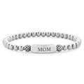Silver beaded bracelet with 'MOM' tag on a white background
