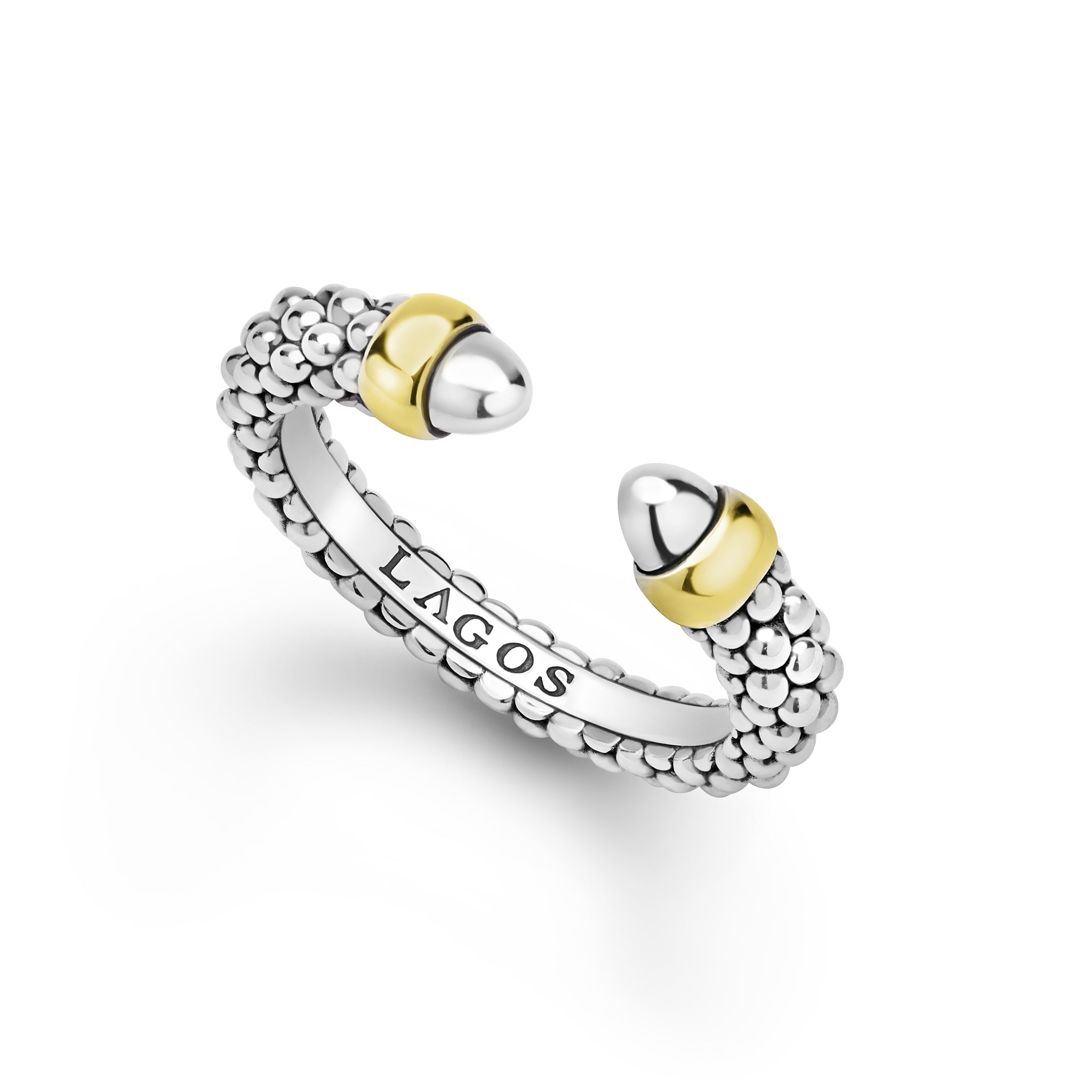 Silver and gold ring with 'LAGOS' branding on a white background