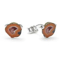 Sterling silver and meticulously crafted crystal geode forms these cuff links. Perfect for an added touch of elegance.