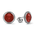 Red jasper gemstone accented by sterling silver Caviar beading forms these skull cuff links.