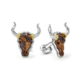 Tiger eye gemstone accented by sterling silver and 18K gold Caviar beading forms these bull motif cuff links.