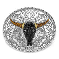 Intricately crafted black agate gemstone and 18K gold surrounded by sterling silver form this bull motif belt buckle.