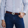 Model wearing Black Agate Long Horn Belt Buckle featuring a polished black agate gemstone with 18K gold horns and sterling silver Caviar beading, dimensions 85mm x 100mm
