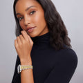 Young woman models the Smart Caviar 18K Gold and Sterling Silver Caviar Beaded Watch Bracelet, showcasing its elegant polished silver and fine gold beading design.
