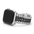 Smart Caviar Black Ceramic and Stainless Steel Infinite Watch Bracelet with polished silver case, featuring reflective beadwork for Apple Watch, showcasing elegance and quality craftsmanship.