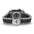 Smart Caviar Black Ceramic and Stainless Steel Infinite Watch Bracelet on Apple Watch Series 7, featuring a multi-strand beaded design.