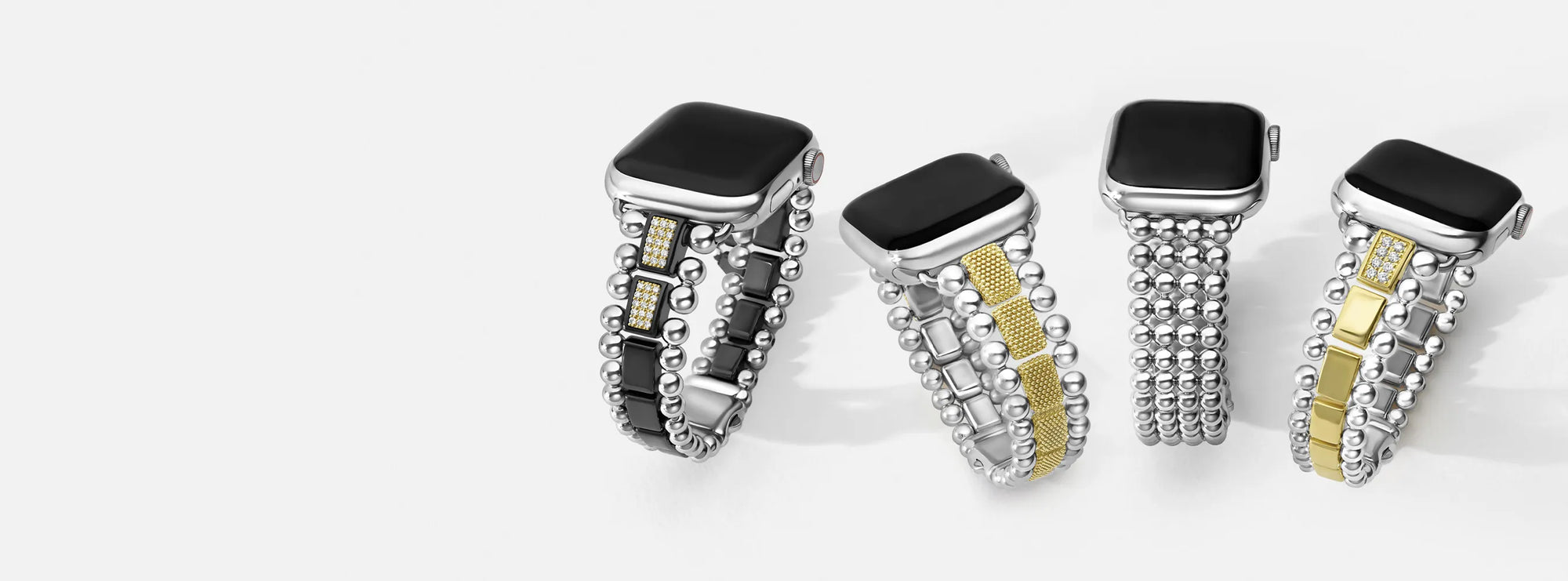 Four smart watch bands in sterling silver, 18k gold, and black ceramic