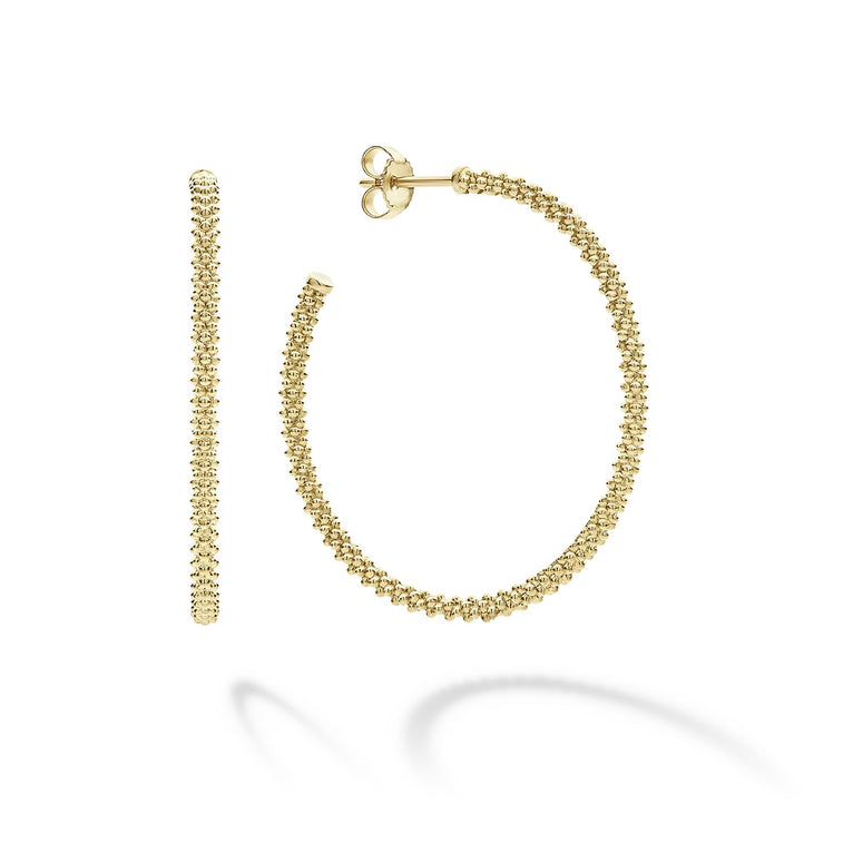 Beautifully detailed 18k gold Caviar beaded hoop earrings to complete any look.