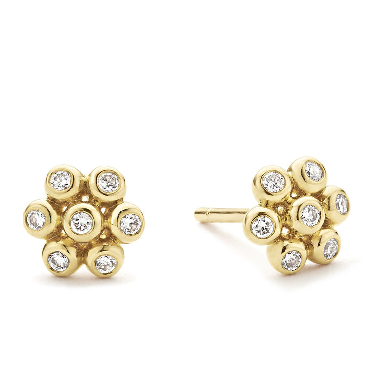 Diamonds and 18K gold form these petite flower stud earrings. LAGOS diamonds are the highest quality natural stones.
