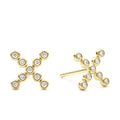 Diamonds and 18K gold form these X stud earrings. LAGOS diamonds are the highest quality natural stones.