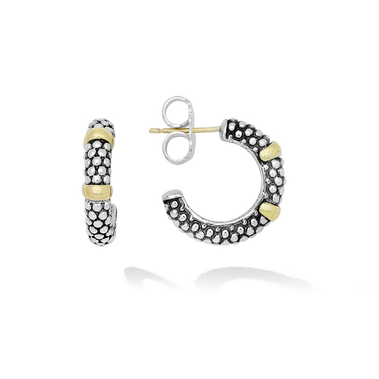 Simple, yet elegant sterling silver Caviar beading accented with bands of 18K gold on these versatile hoop earrings.