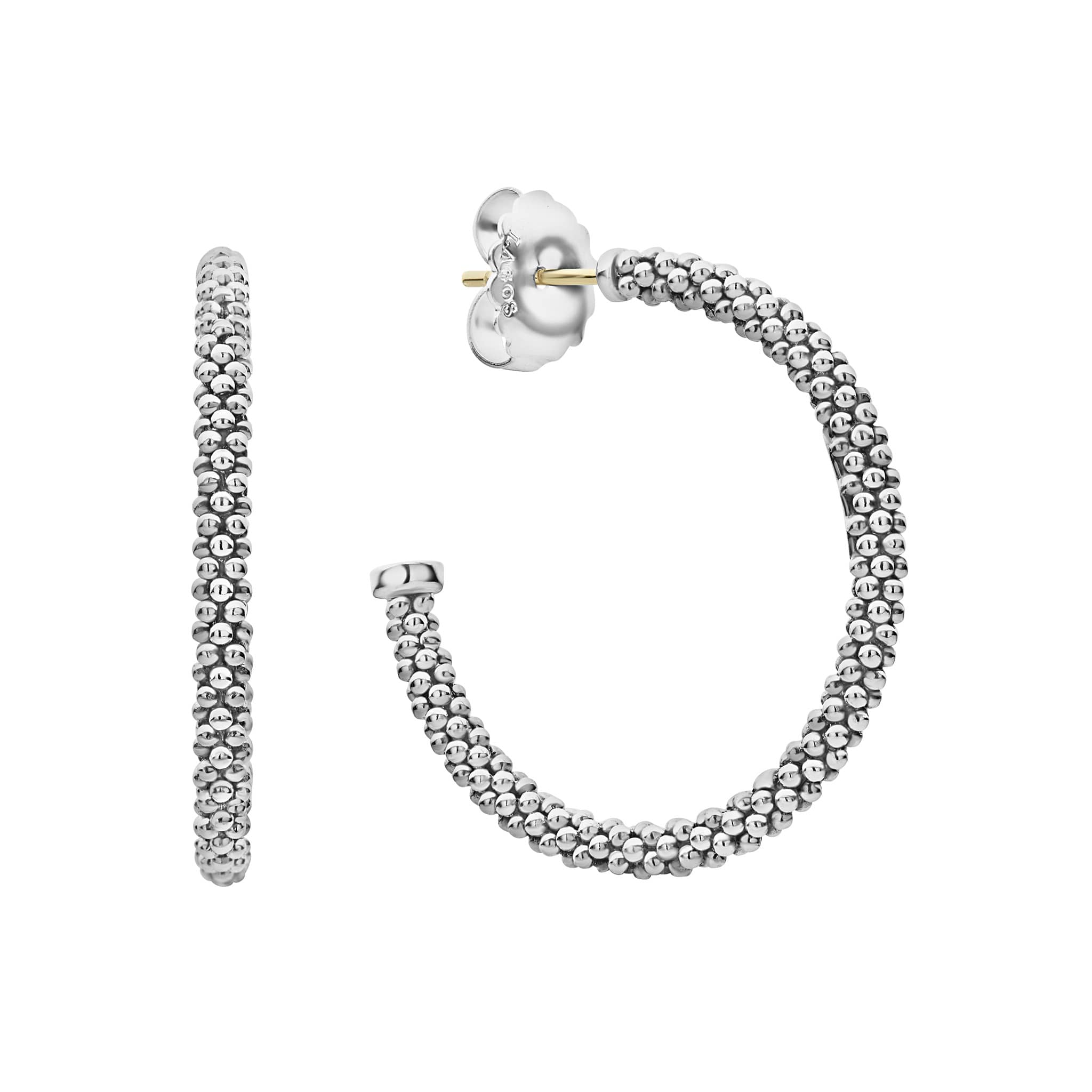 Signature sterling silver Caviar beads form these classic hoop earrings.